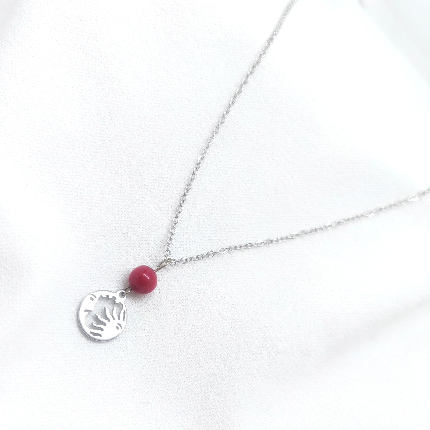 Collier en acier inoxydable en rhodonite, fabrication artisanal